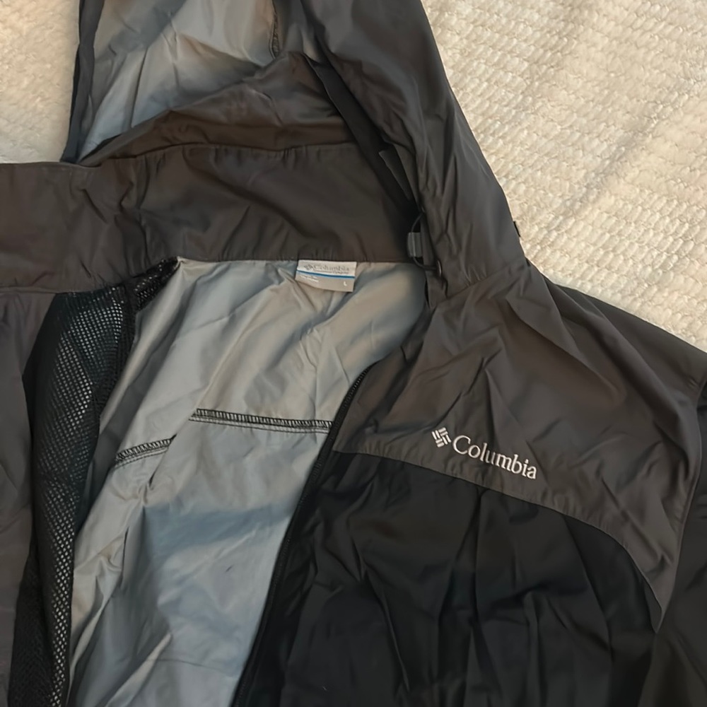 Black and gray Columbia zip up rain jacket